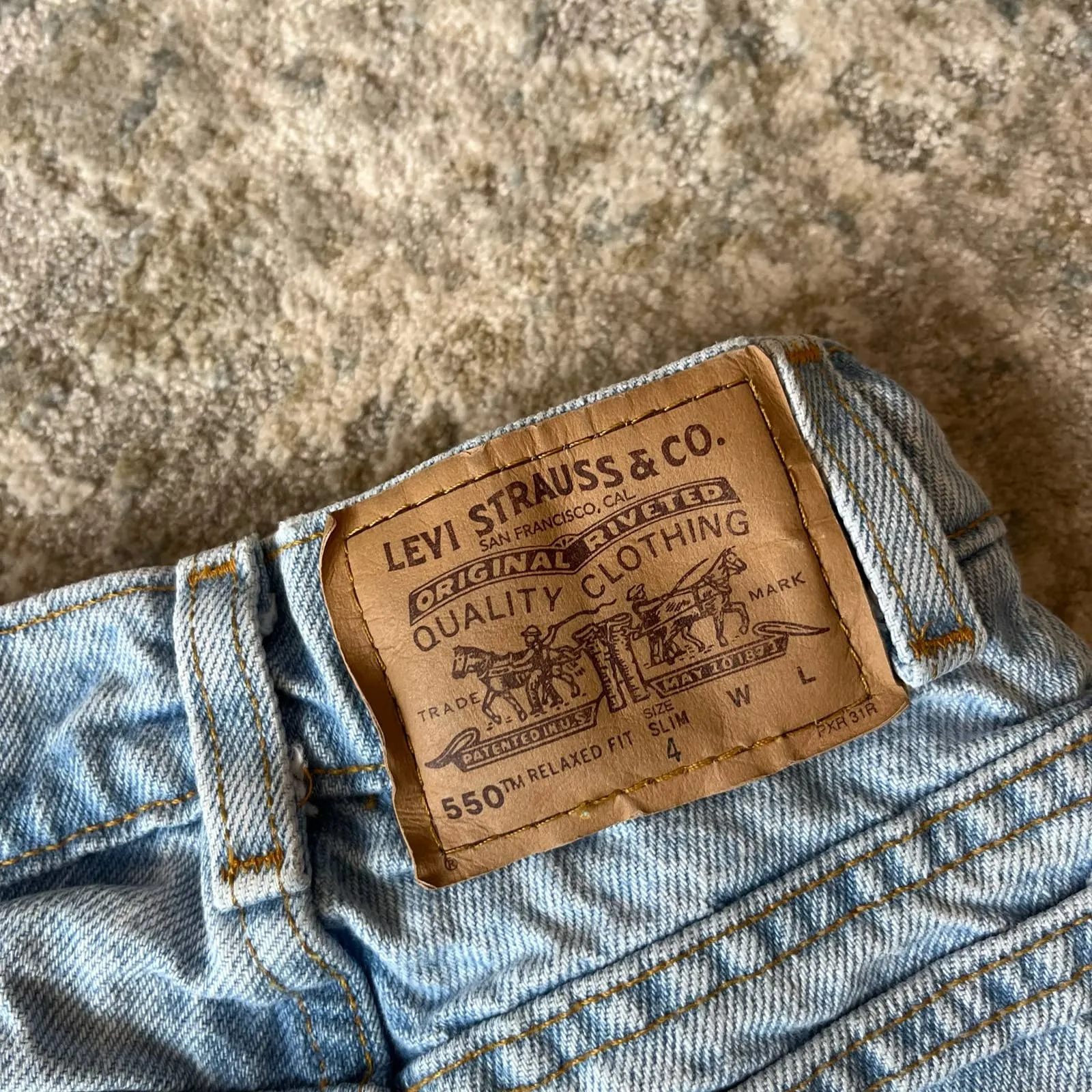 Vintage Levi's 550 Relaxed Fit Slim Orange Tab Jeans 4T